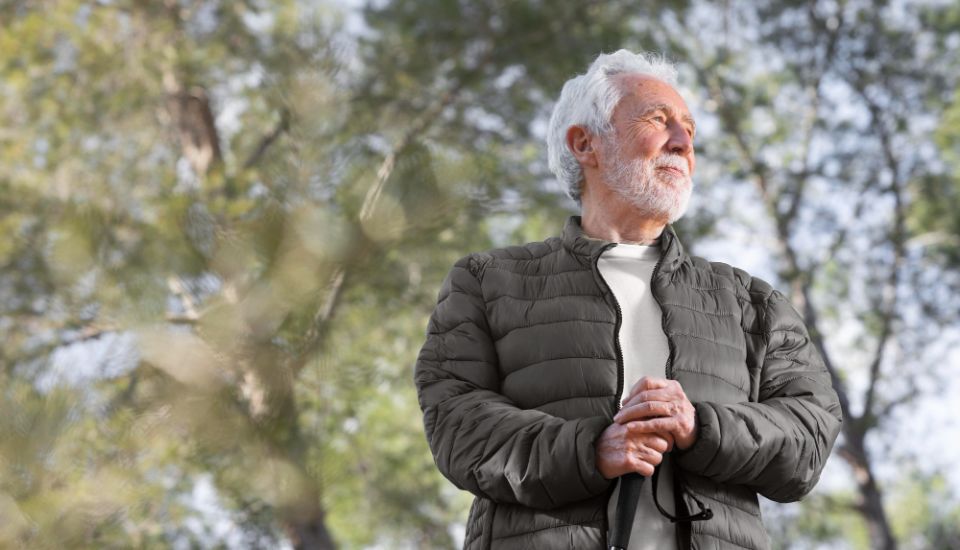 elderly man looks ahead
